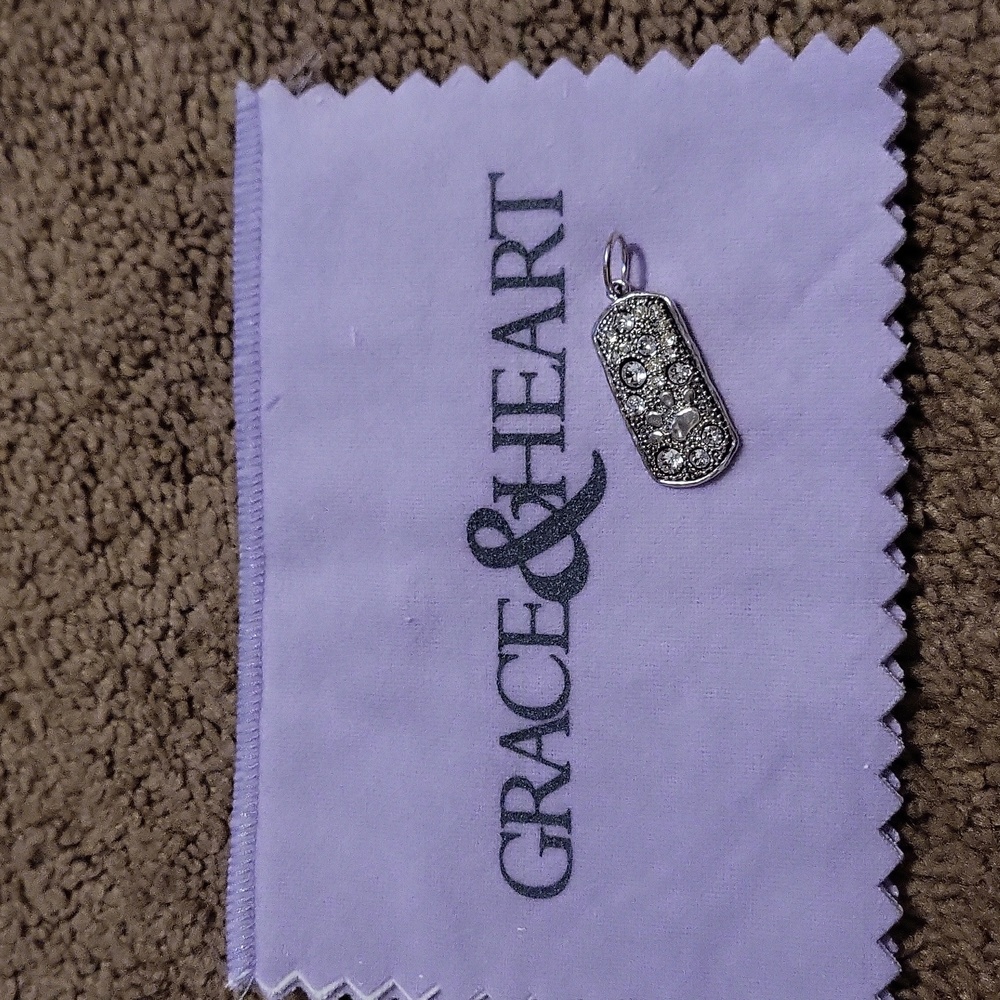 Grace and Heart paw print